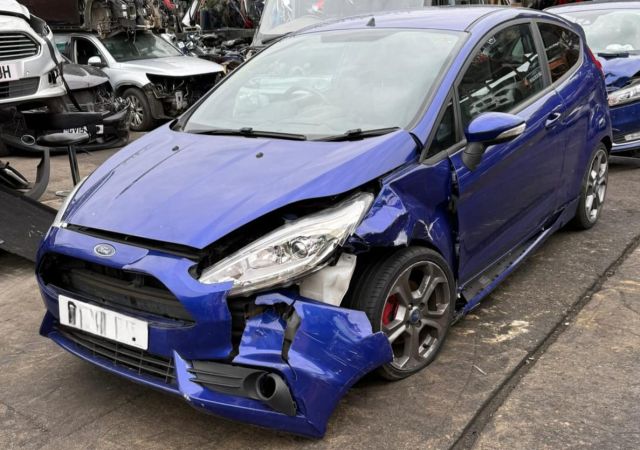 Damaged blue Ford Fiesta
